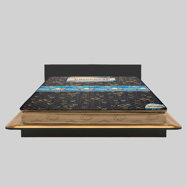 Mattress on a wooden bed frame with 'Universal' branding on a gray background