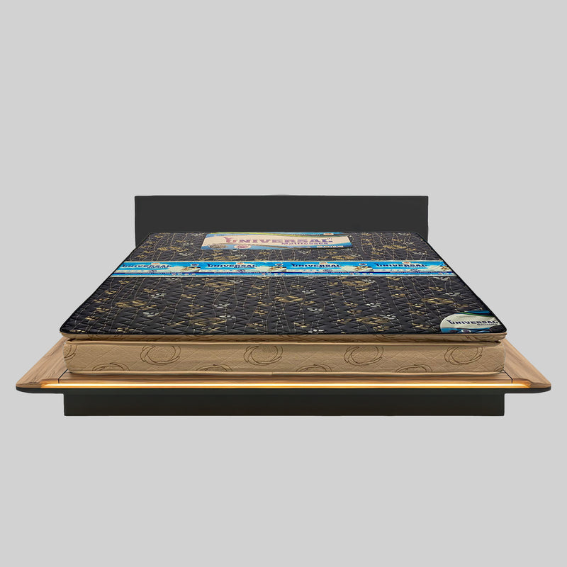 Mattress on a wooden bed frame with 'Universal' branding on a gray background