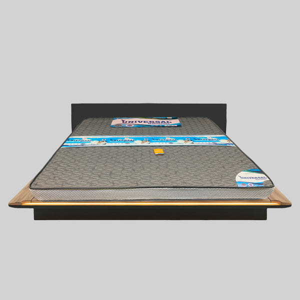Mattress with Universal brand packaging on a gray background
