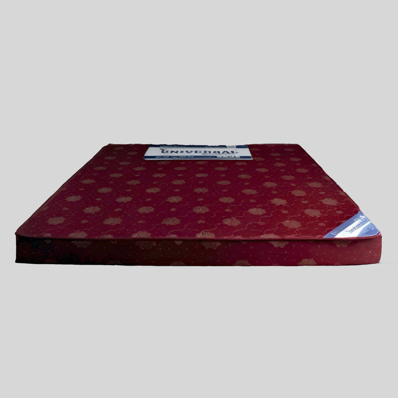 Red mattress with a pattern on a gray background