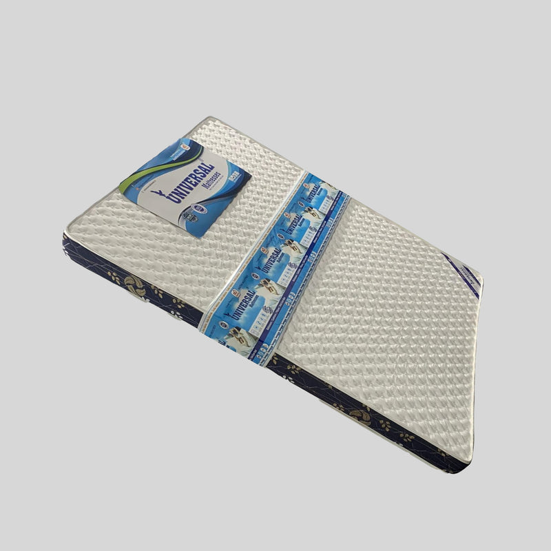 Mattress topper with 'Universal' branding on a gray background