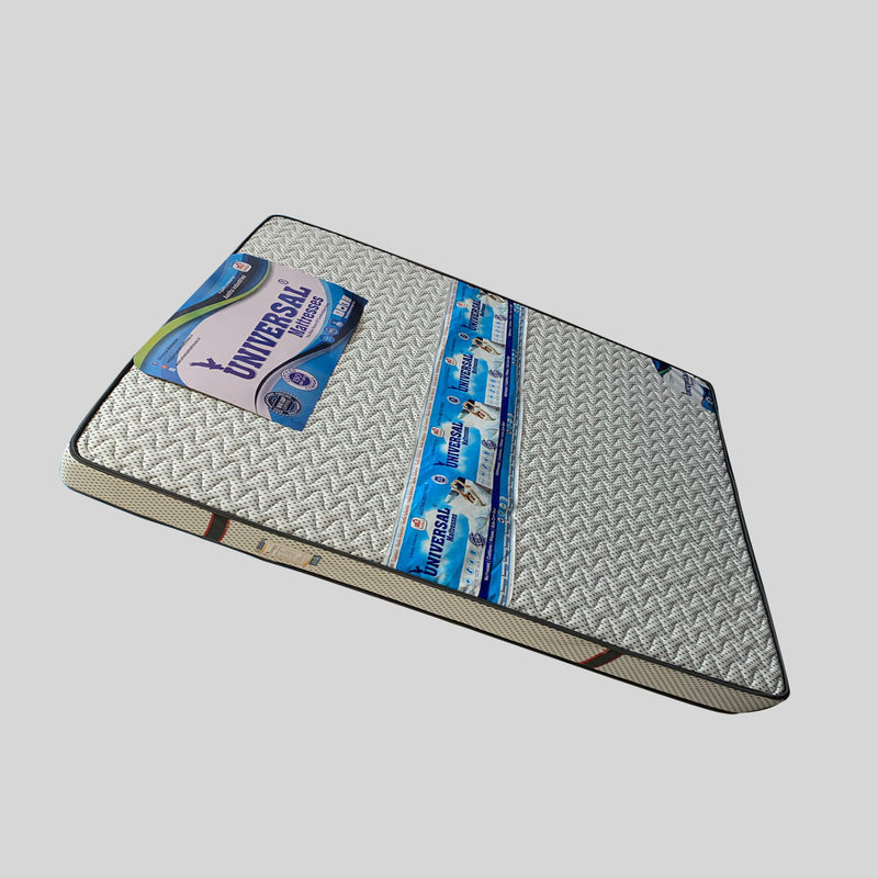 Mattress with a brand label on a gray background