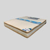 Mattress with brand logo on a gray background