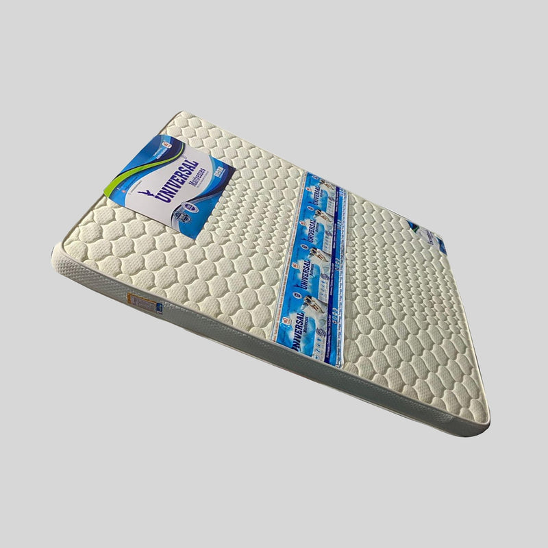 Mattress with 'Universal' branding on a gray background