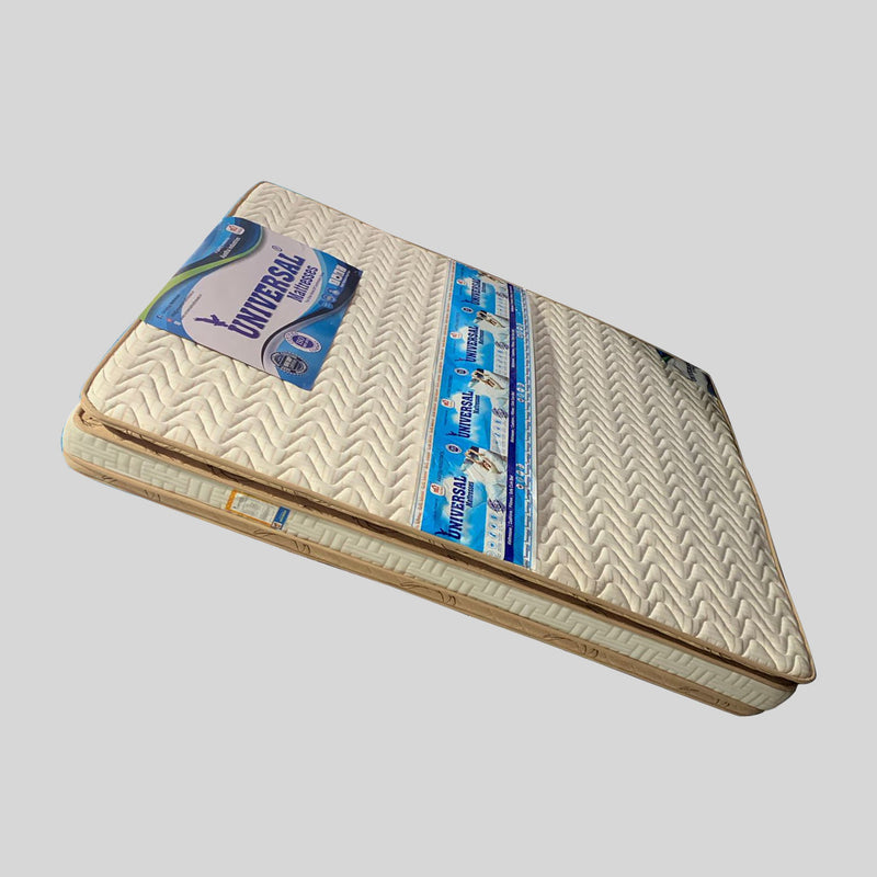 Mattress with 'Universal' branding on a gray background