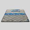 Mattress with 'Universal' branding on a gray background