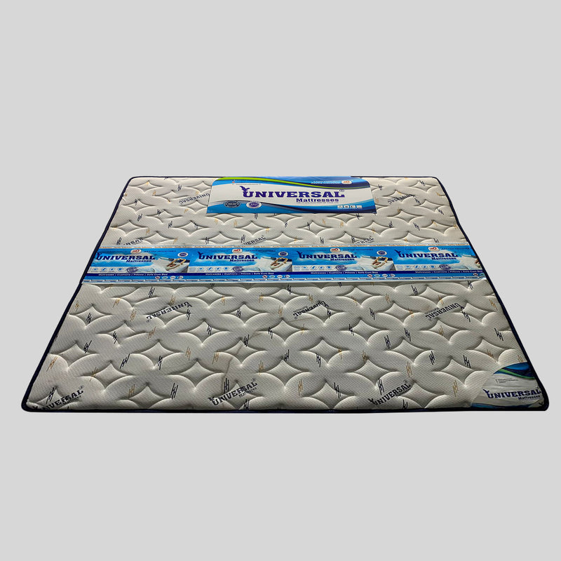 Mattress with 'Universal' branding on a gray background