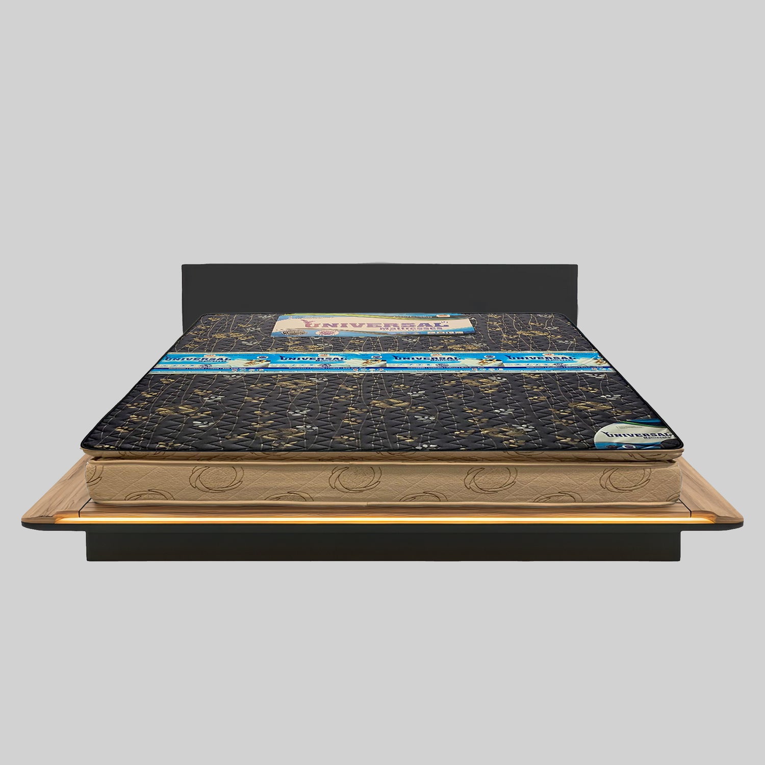 Mattress on a wooden bed frame with 'Universal' branding on a gray background
