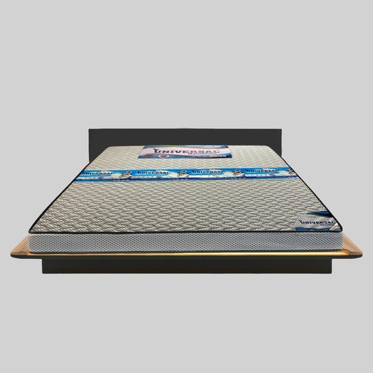 Mattress on a bed frame with 'Universal' branding on a gray background